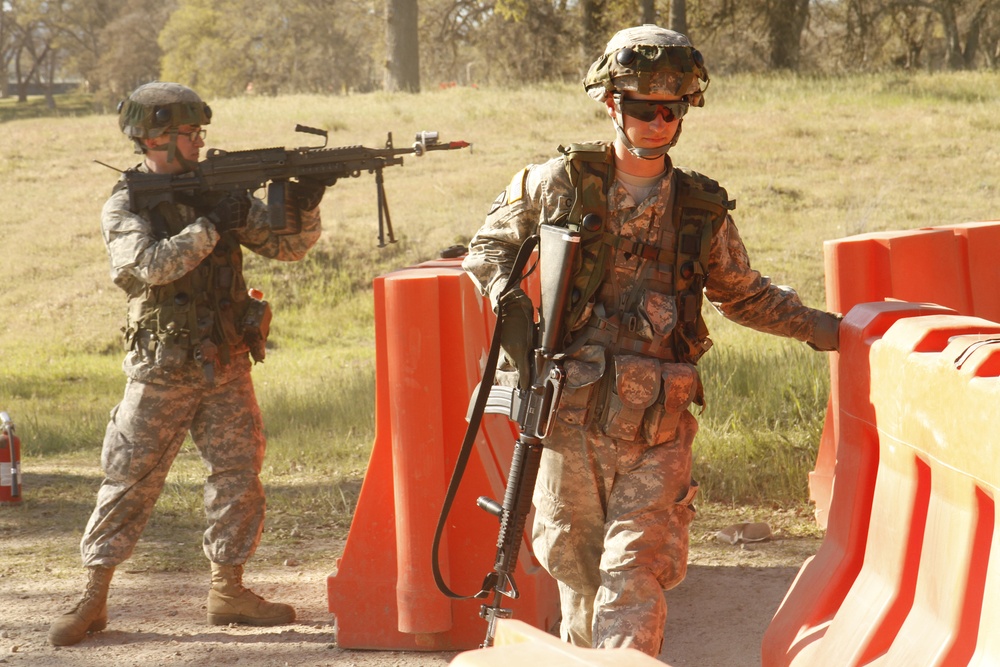 US Army Cpl. Jayden O'Dell pulls security with his M249 Squad Automatic Weapon with Spc. Connor Orion