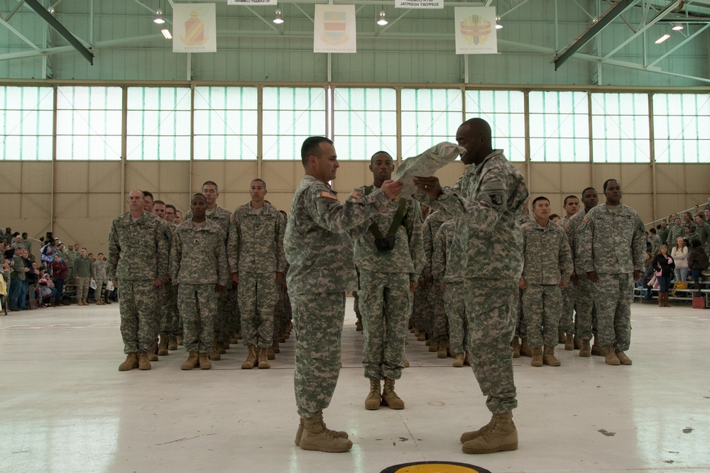 Soldiers return from Liberia and Sustainers uncase their colors