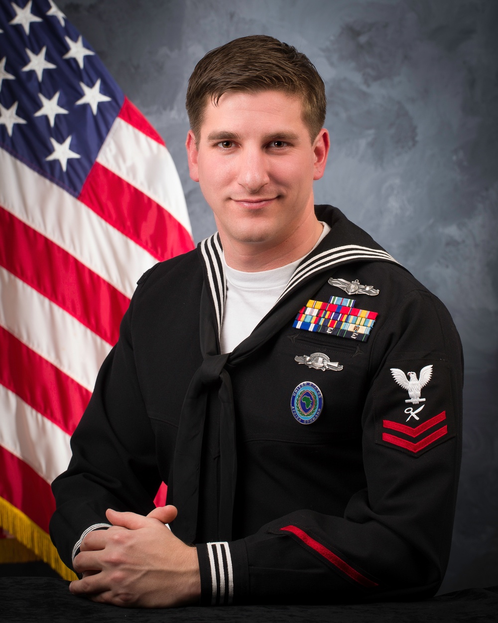 Official portrait, Intelligence Specialist 2nd Class Travis J. Benson, United States Naval Reserve