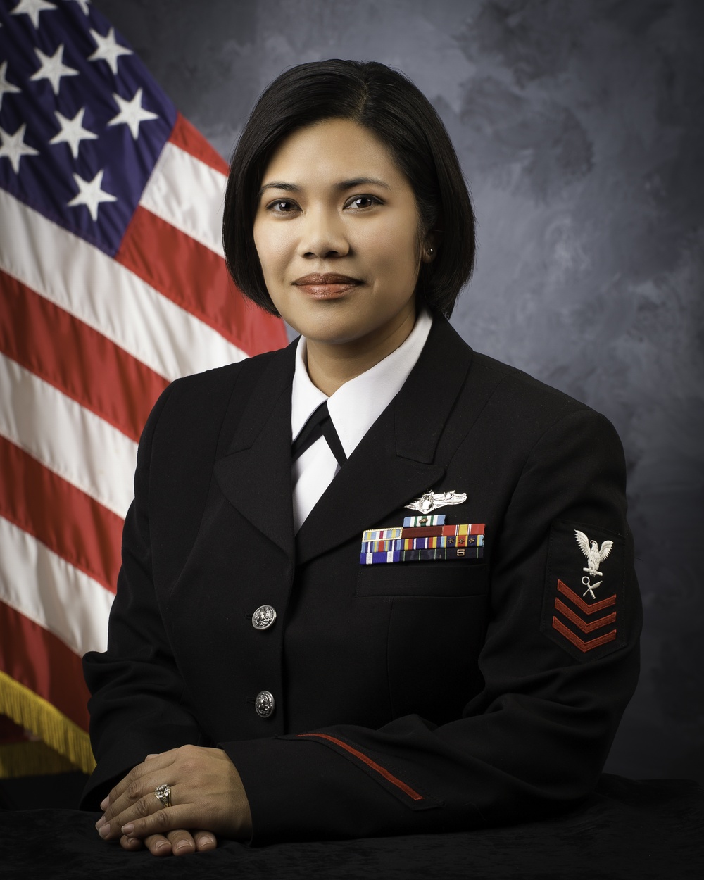 Official portrait, Intelligence Specialist 1st Class Marlo V. Perlas, United States Naval Reserve