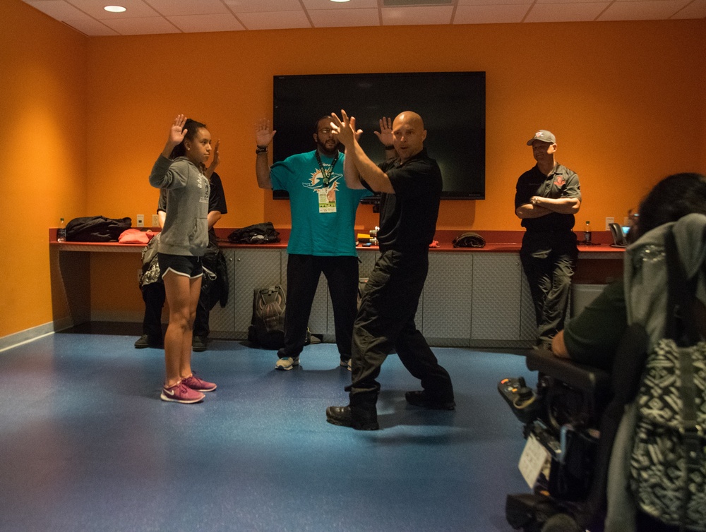 USASOC Black Daggers demonstrate free fall tactics at Miami Children’s Hospital