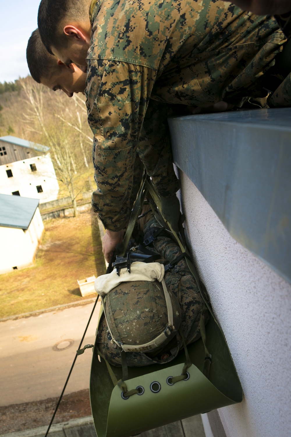 Down and Out: MAGTF Marines rappel with Special Forces