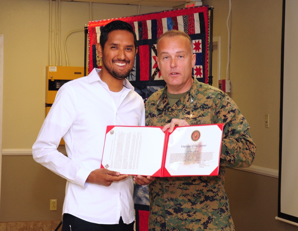 Carlos Guerra receives Employee of the Quarter award