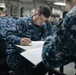 USS John C. Stennis Sailors take E-5 exam
