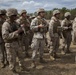 2D Transportation Support Battalion Marines practice throwing hand grenades with Headquarters Battery