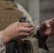 2D Transportation Support Battalion Marines practice throwing hand grenades with Headquarters Battery