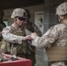 2D Transportation Support Battalion Marines practice throwing hand grenades with Headquarters Battery