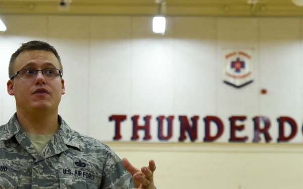 799th SFS K-9 handlers demonstrate military working dog skills, training to students