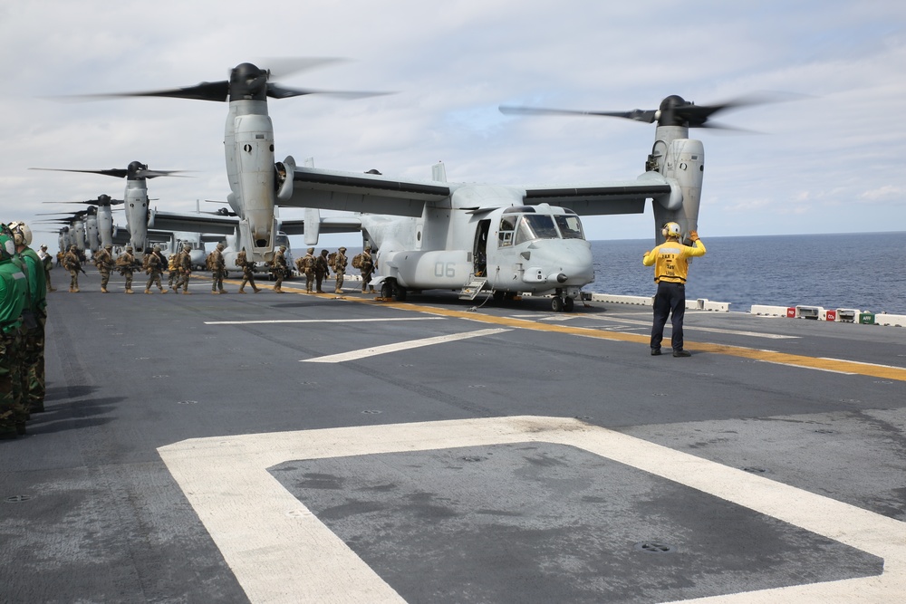 Eight Ospreys take off from USS Bonhomme Richard