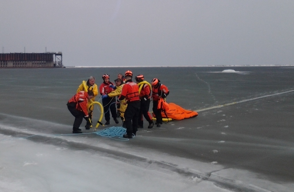 Coast Guard, Marquette first responders join efforts during rescue of fisherman who fell through ice near Presque Isle Harbor