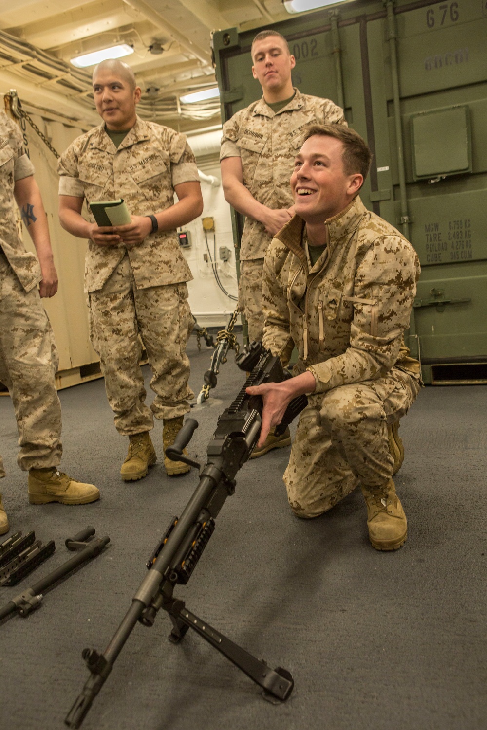 U.S. Marines conduct weapons classes aboard USS Arlington (LPD-24)