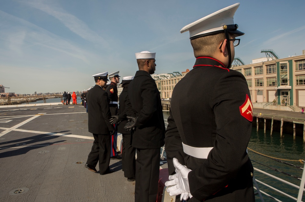 U.S. Marines aboard the USS Arlington (LPD-24) arrive in Boston, Massachusetts for parade