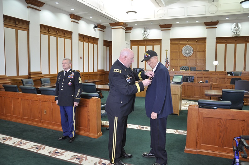 Corporal Robert A. Marshall receives Bronze Star with 'V' device nearly 63 years after having earned it