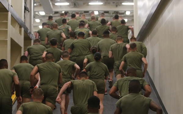 Marines PT while at sea