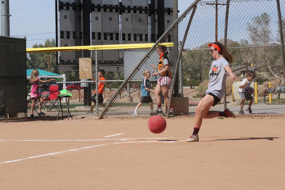 Spouses go toe-to-toe in kickball league