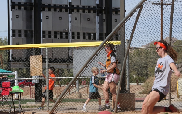 Spouses go toe-to-toe in kickball league