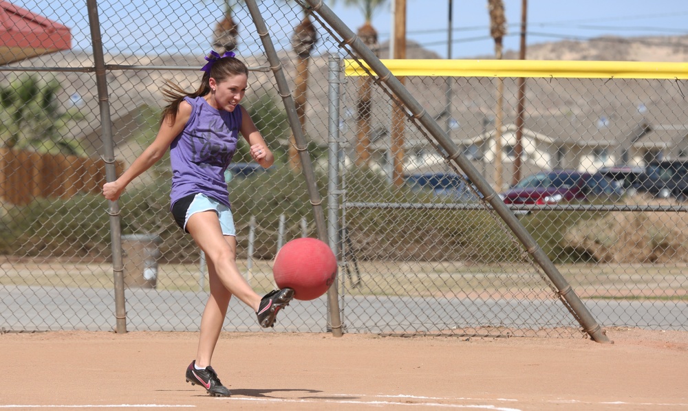 Spouses go toe-to-toe in kickball league
