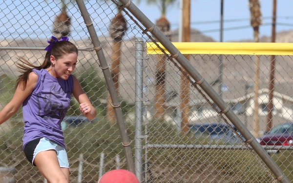 Spouses go toe-to-toe in kickball league