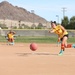 Spouses go toe-to-toe in kickball league