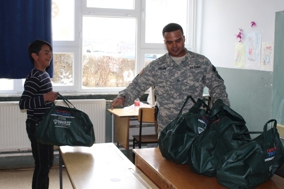Soldiers visit Kosovo schools to give gifts
