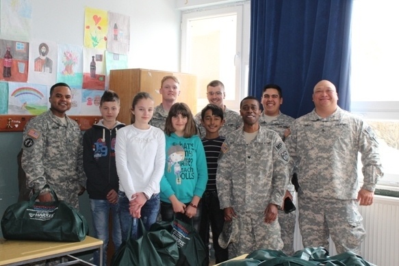 Soldiers visit Kosovo schools to give gifts