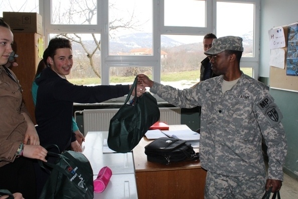 Soldiers visit Kosovo schools to give gifts