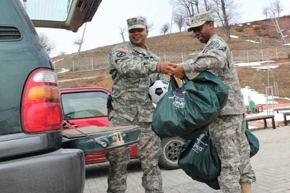 Soldiers visit Kosovo schools to give gifts