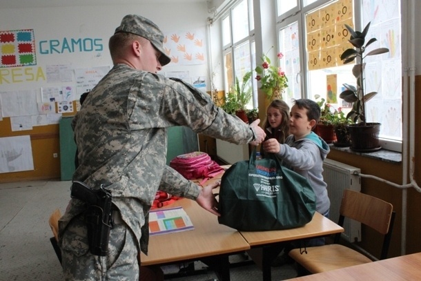 Soldiers visit Kosovo schools to give gifts