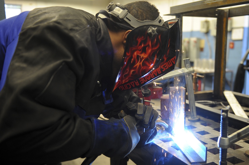 Aircraft metal technology shop crafts precision art to repair jets