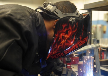 Aircraft metal technology shop crafts precision art to repair jets