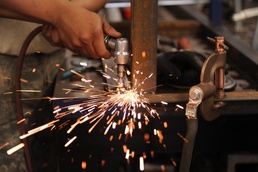 Aircraft metal technology shop crafts precision art to repair jets