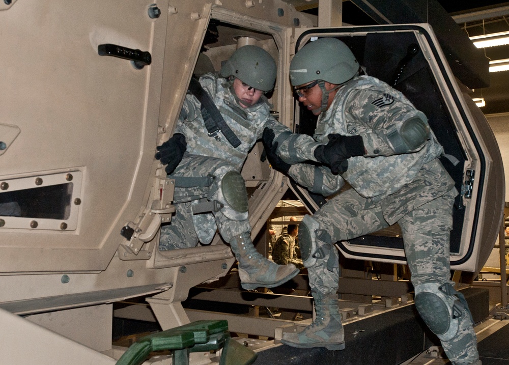 Operational Contract Support Joint Exercise 2015 Mine-Resistant Ambush-Protected Egress vehicle rollover simulator