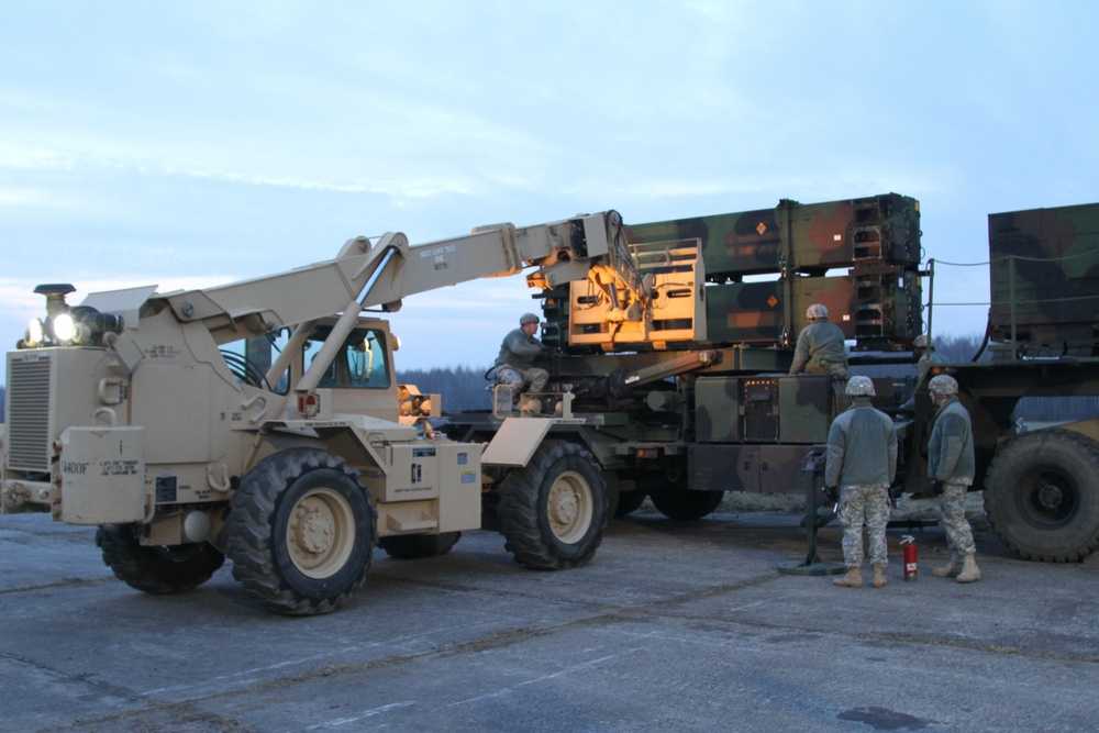 5-7 ADA Soldiers load rockets onto Patriot launcher