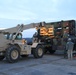 5-7 ADA Soldiers load rockets onto Patriot launcher