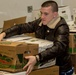 U.S. Marines package food for charity at the Greater Boston Food Bank
