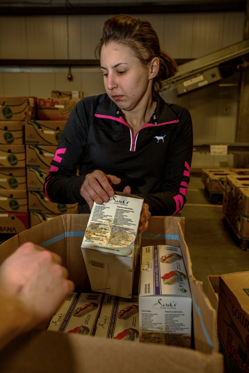 U.S. Marines package food for charity at the Greater Boston Food Bank
