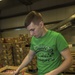 U.S. Marines package food for charity at the Greater Boston Food Bank