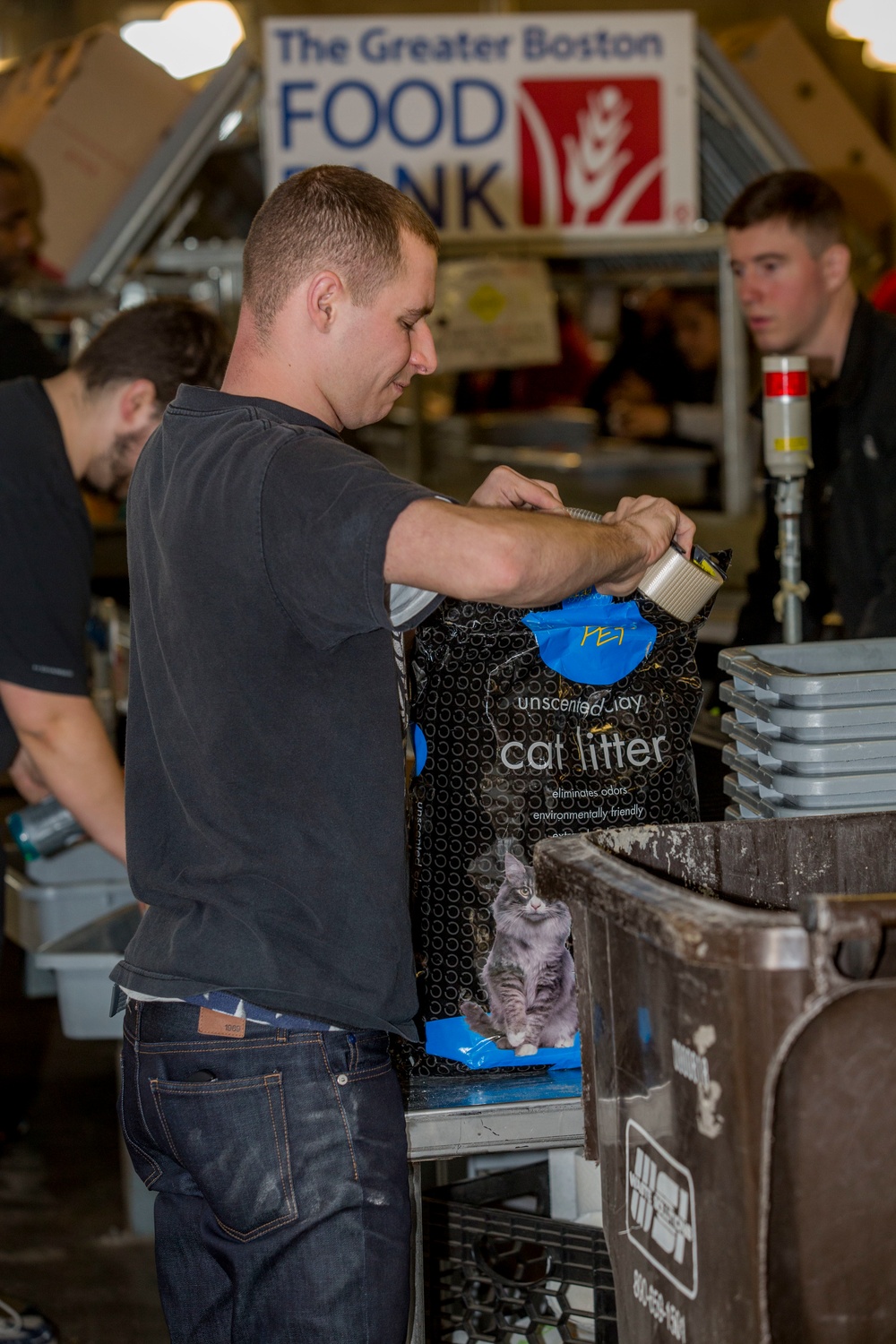 U.S. Marines package food for charity at the Greater Boston Food Bank