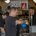 U.S. Marines package food for charity at the Greater Boston Food Bank