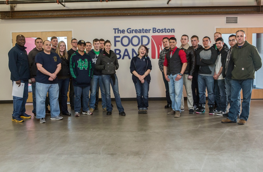 U.S. Marines package food for charity at the Greater Boston Food Bank