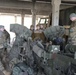 Michigan National Guard Red Lions conduct howitzer maintenance checks with Latvian Land Forces