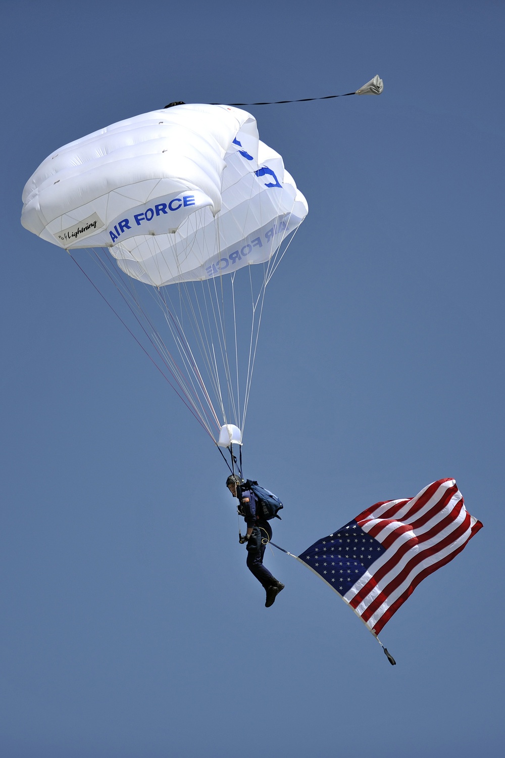 Air Force Academy's Wings of Blue parachutist drops into Falcon Stadium