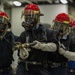 Sailors fight a simulated fire during a general quarters drill