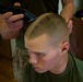 Marine shaves his head