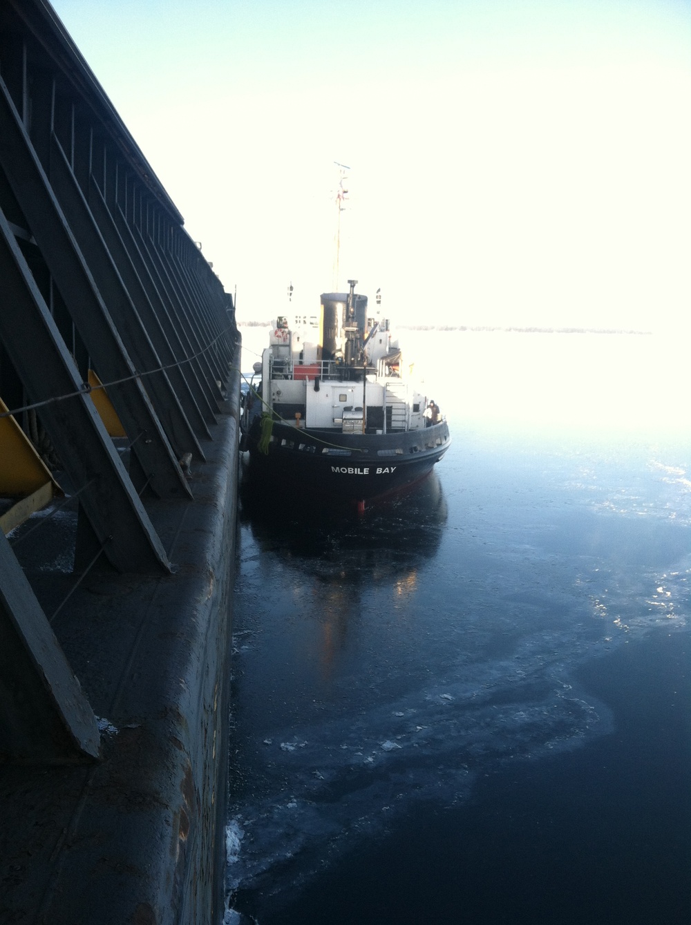 USCGC Mobile Bay secures breakaway barge