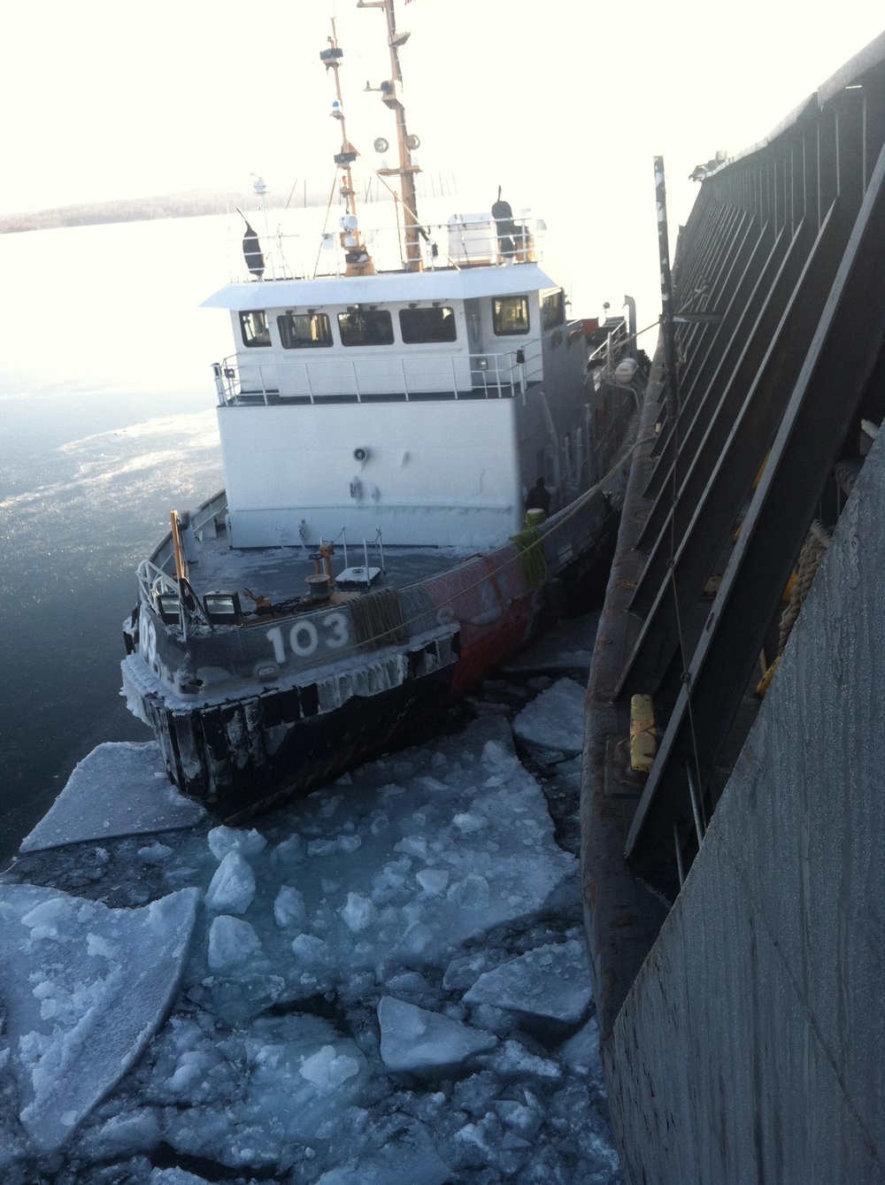 USCGC Mobile Bay secures breakaway barge