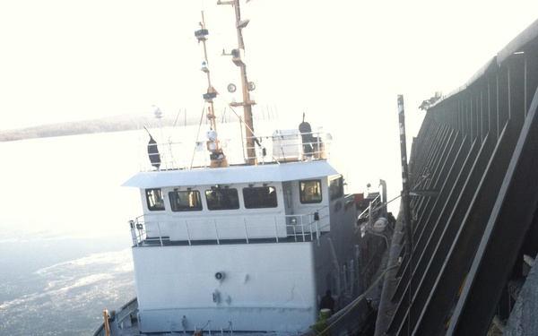 USCGC Mobile Bay secures breakaway barge