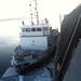 USCGC Mobile Bay secures breakaway barge