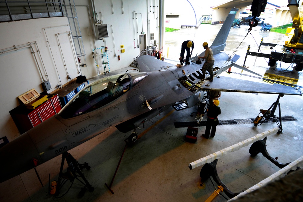 Preparing to soar: Airmen replace jet's wing
