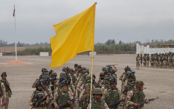 Iraqi soldiers prepare for a day of training